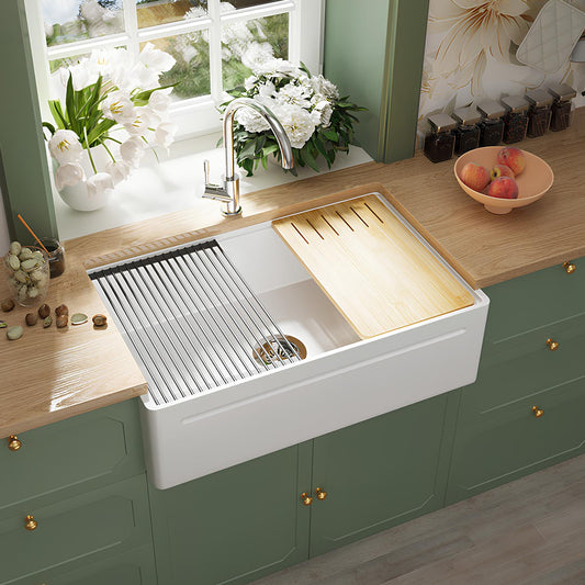 SANIKB SN101W3320 fireclay farmhouse sink with bamboo cutting board and drying rack in use.
