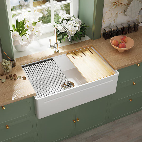 SANIKB SN101W3320 fireclay farmhouse sink with bamboo cutting board and drying rack in use.