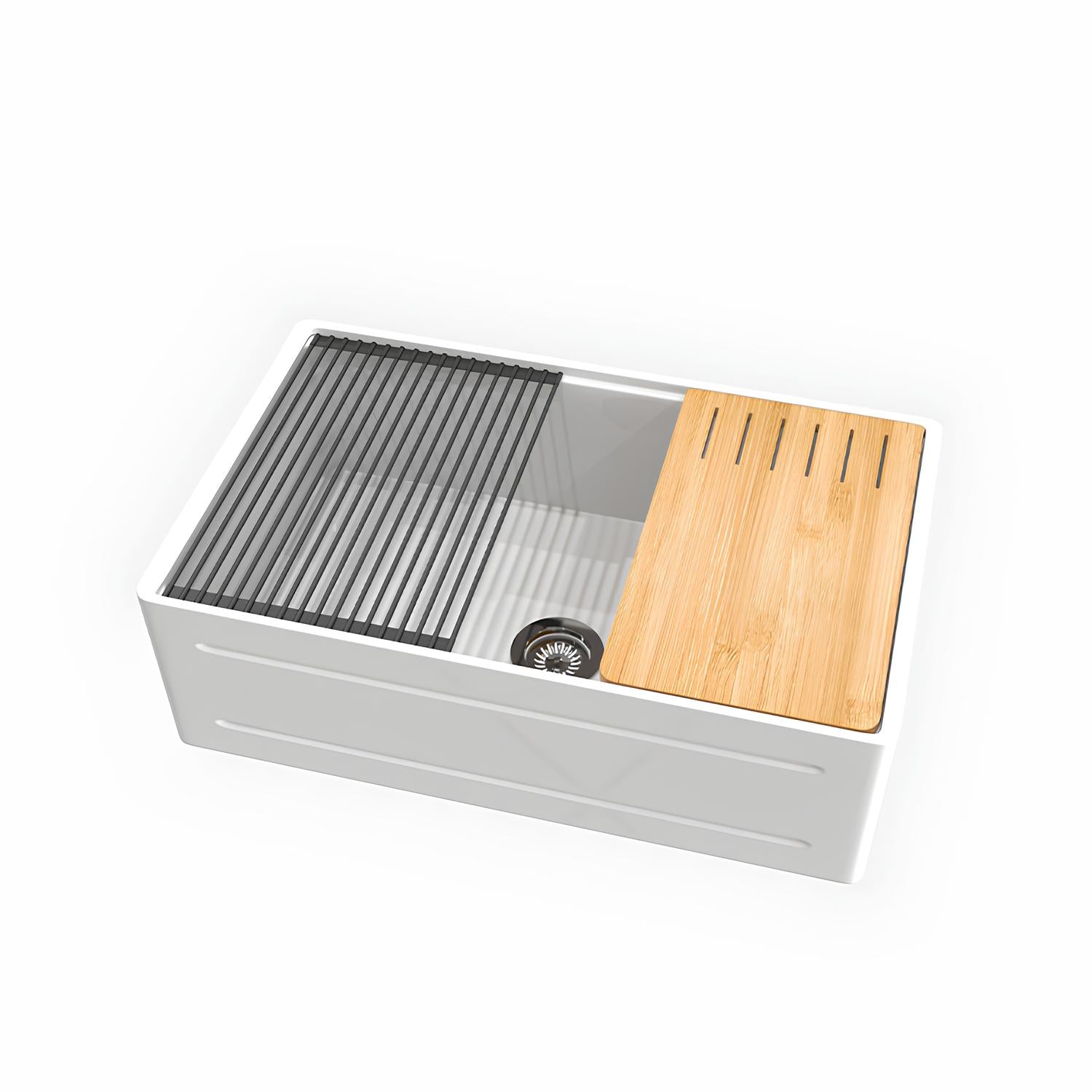 Kitchen sink with grill, cutting board, and drainboard on a white background